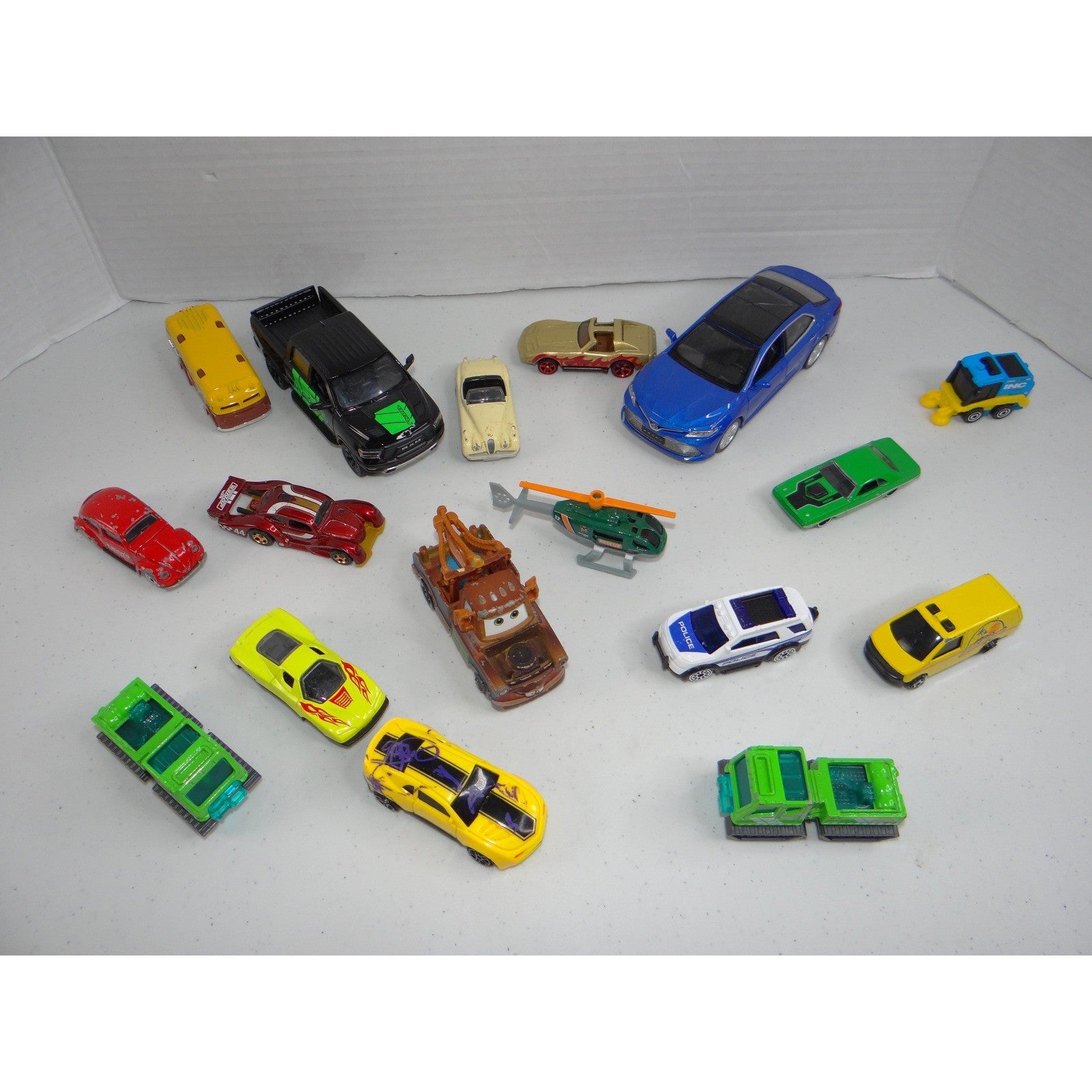 Mixed Toy Car Lot 16pc Disney Pixar Tow Mater Toyota Ram Truck Helicopter Police