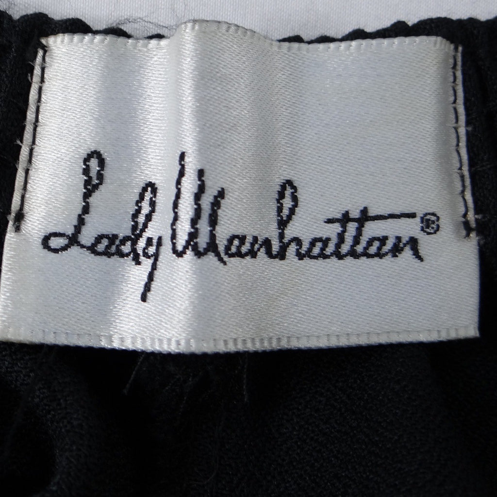 Vintage Lady Manhattan Black Midi Skirt Elastic Waist Size 12 Polyester Rayon